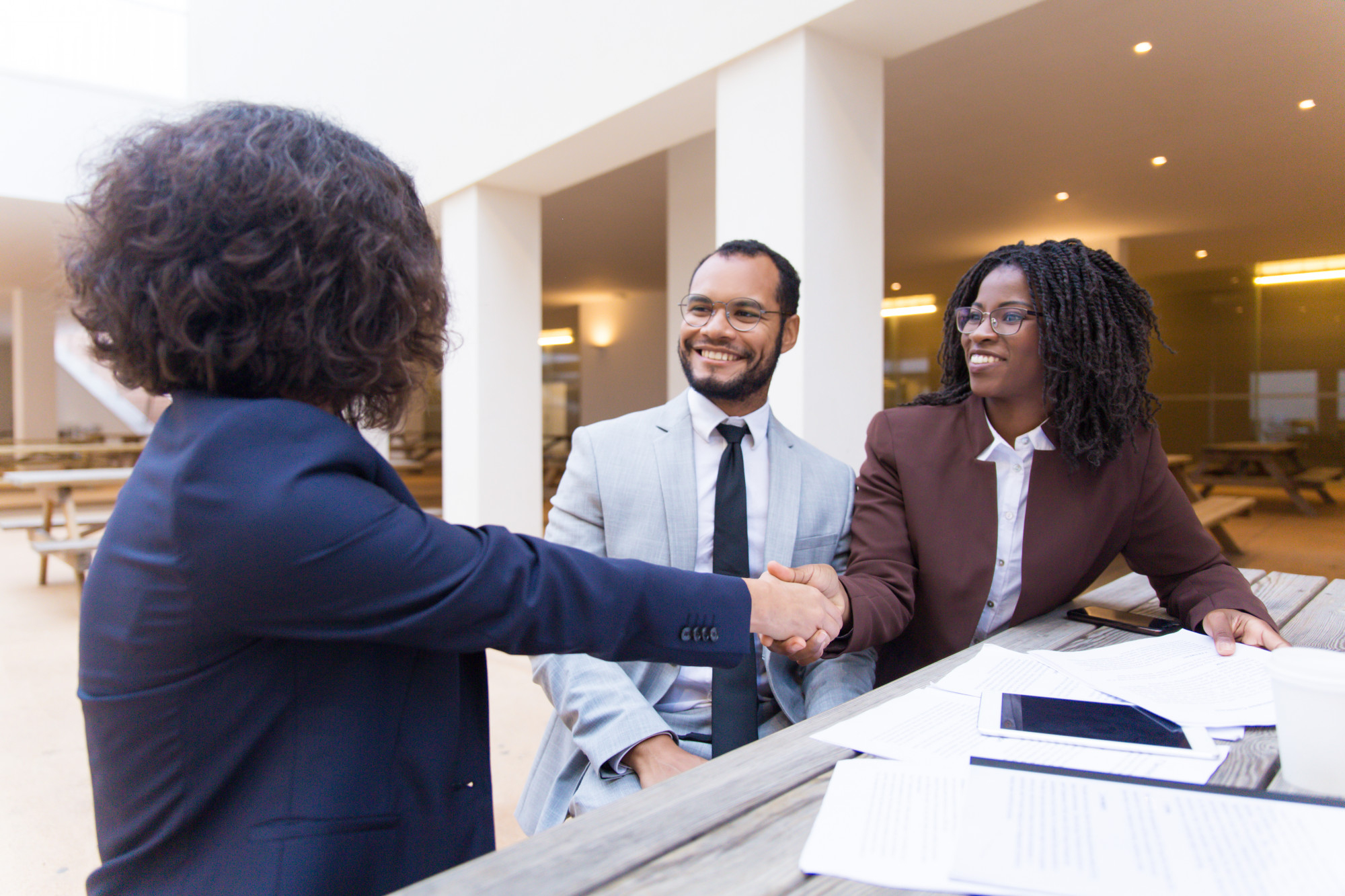 satisfied-customers-thanking-professional-help